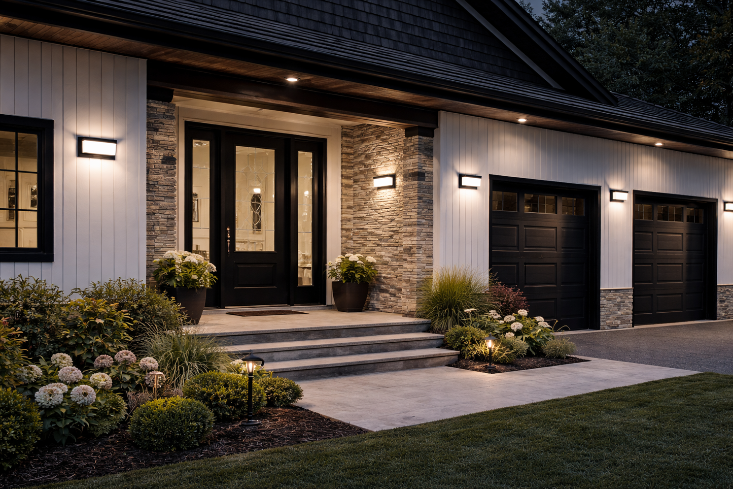 LED Outdoor Wall Lights illuminating a modern home entrance at night, featuring stylish aluminum design and surrounding landscaping.