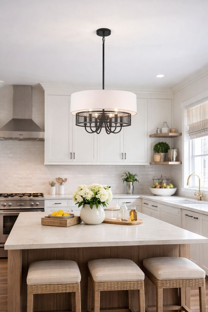 Modern drum chandelier in a kitchen setting, featuring a 6-light design and black fabric shade, enhancing farmhouse decor.